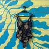 Vestido de baño enterizo negrocon hojas doradas talla L