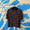 Camisa negra con flores amarillas Talla M