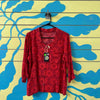 Camisa naranja con arabescos rojos talla M
