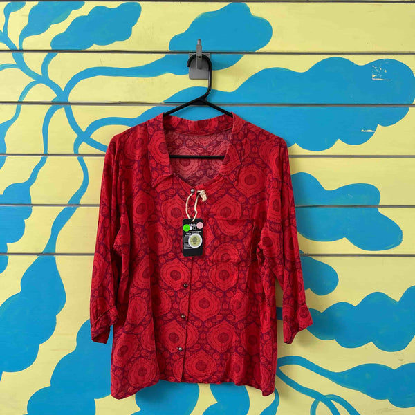 Camisa naranja con arabescos rojos talla M