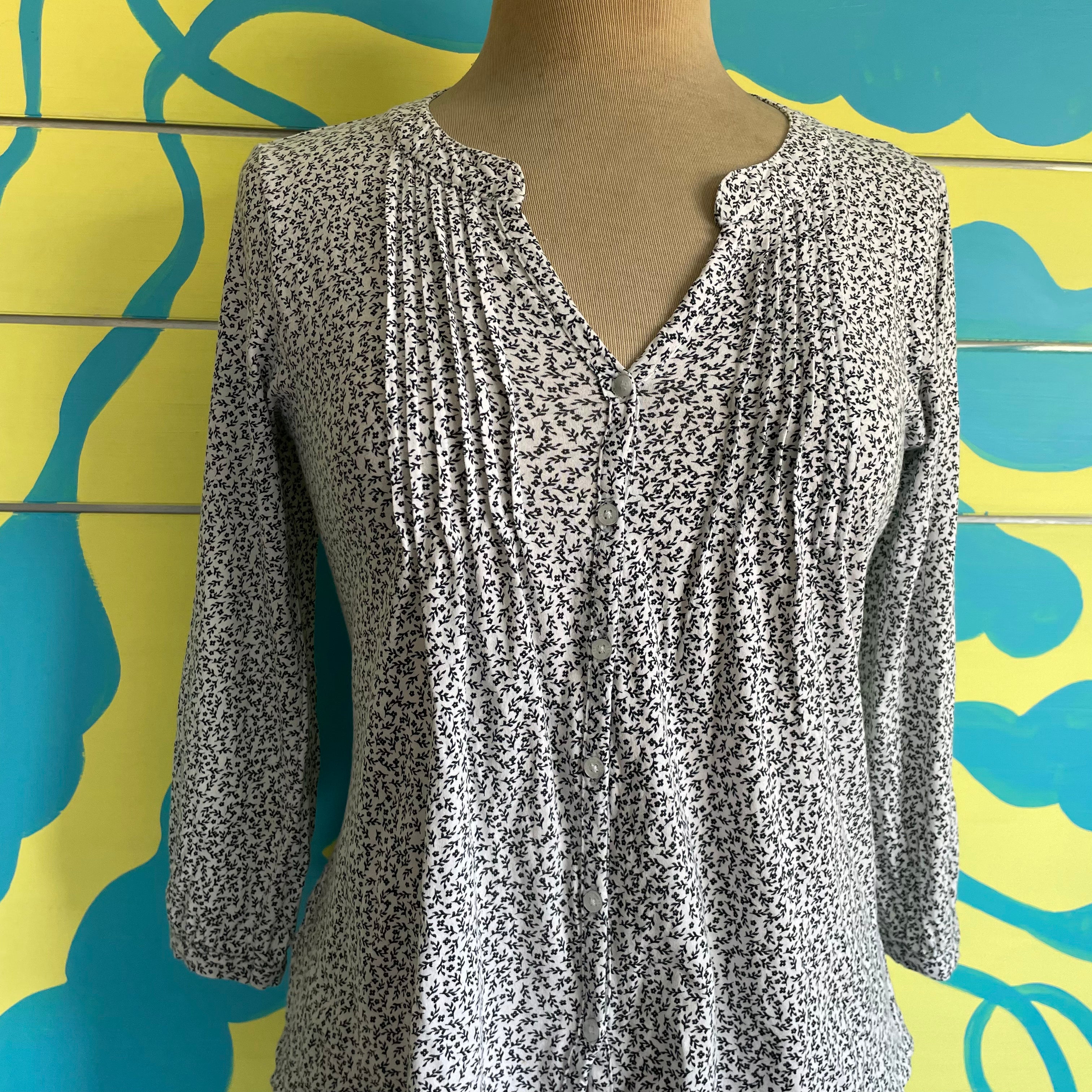 Camisa media manga estampado flores