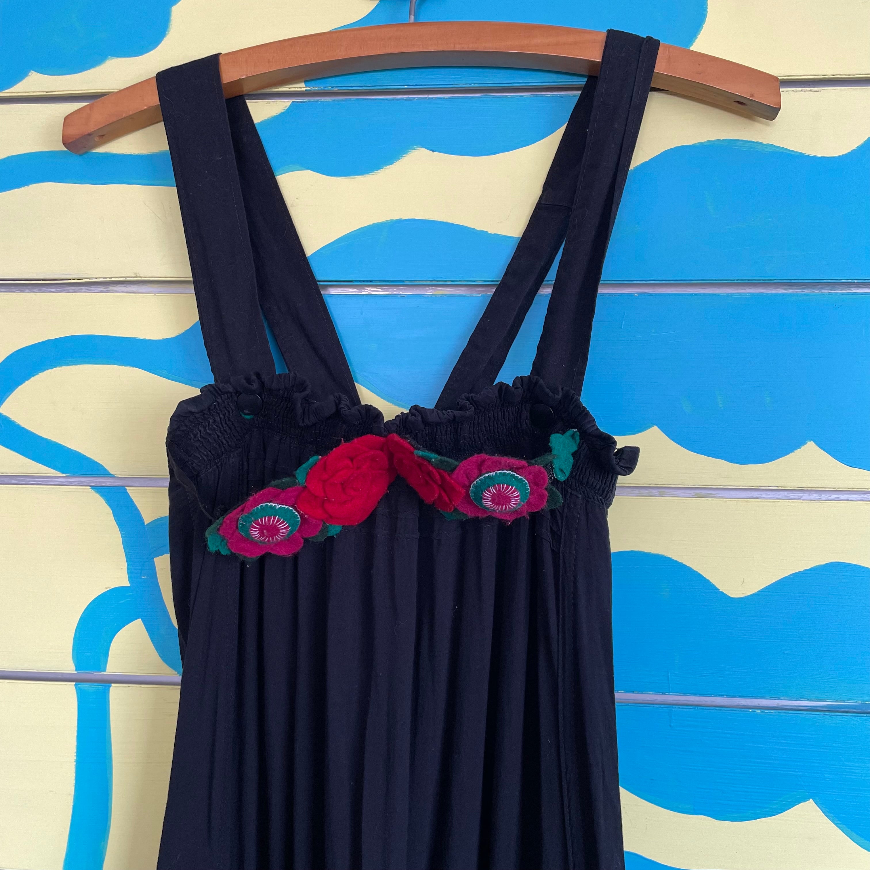 Enterizo Negro Flores Rojas