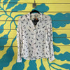 Blusa camisera blanca de piñas
