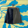 Minifalda de cuerina verde y negro talla 34
