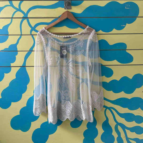 Camiseta transparente blanca Talla L - Secondary