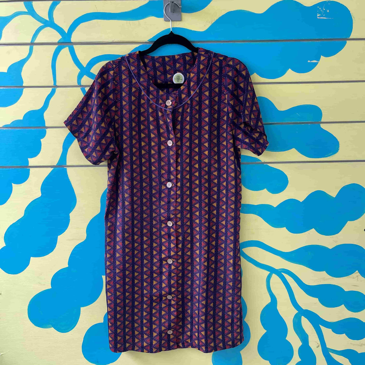 Vestido morado triangulos amarillos y naranja talla M