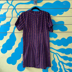 Vestido morado triangulos amarillos y naranja talla M