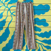 Pantalon blanco con rayas amarillas talla M