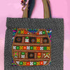 Bolso de tela con tejido