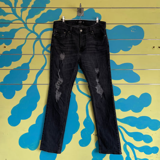 Jean Hombre Negro Rotos